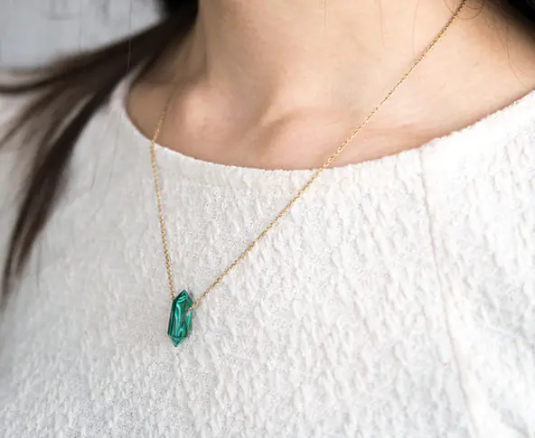 Pencil_necklace_brass_malachite_styled_650x650.jpg